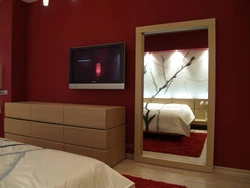 Mirrors opposite the bed in the bedroom photo