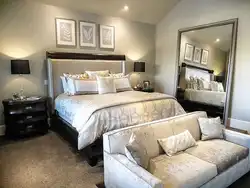 Mirrors opposite the bed in the bedroom photo