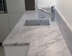 Italian marble countertop in the kitchen interior