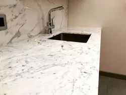 Italian marble countertop in the kitchen interior
