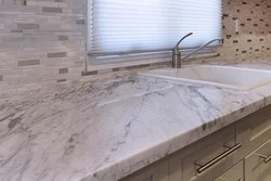 Italian marble countertop in the kitchen interior