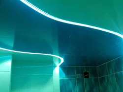 Light lines on a suspended ceiling photo in the bath