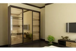 Hallway Closet With 3 Doors Photo