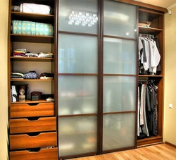 Hallway closet with 3 doors photo