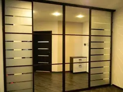 Hallway Closet With 3 Doors Photo