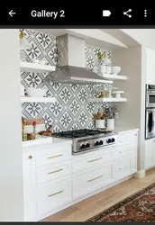 Aprons for white kitchen interior photo