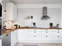 Kitchen interior with white tiles photo