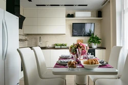 Photo Of A Small Kitchen With A TV