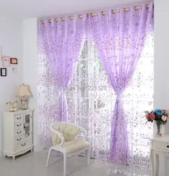 Tulle with flowers in the bedroom interior
