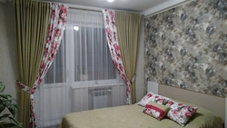 Tulle with flowers in the bedroom interior