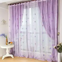 Tulle with flowers in the bedroom interior