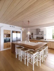 Kitchen ceiling design in a wooden house
