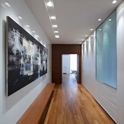 Suspended ceilings in the long corridor of the apartment photo