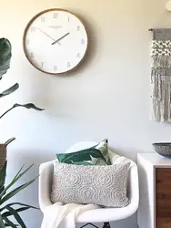 Clock on the wall for the kitchen photo in the interior