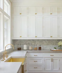 Button handles in the kitchen in the interior