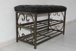 Forged shoe rack in the hallway photo