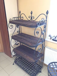 Forged shoe rack in the hallway photo