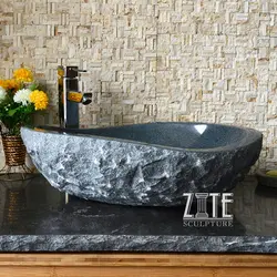 Bathroom sinks made of stone photo