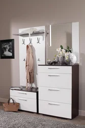 Chest of drawers in the hallway with a mirror in a modern style photo