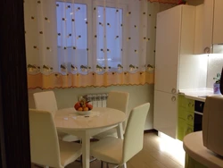 Photos of small kitchens with a round table