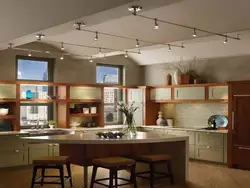 Kitchen design with track lamps photo