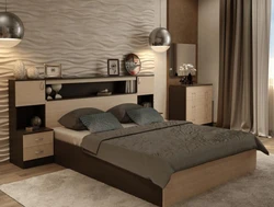 Photo of a bedroom with a bed and bedside tables