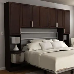 Photo of a bedroom with a bed and bedside tables