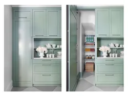 Refrigerator in a niche in the interior of the kitchen