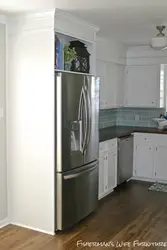 Refrigerator In A Niche In The Interior Of The Kitchen
