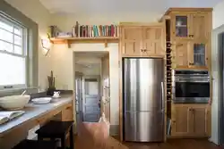 Refrigerator In A Niche In The Interior Of The Kitchen