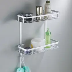 Shelf in the bathtub for shampoos photo