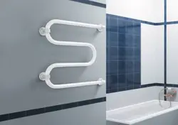 How to hang a heated towel rail in the bathroom photo