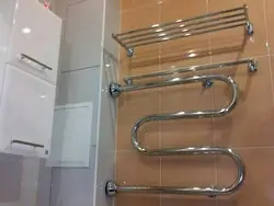 How to hang a heated towel rail in the bathroom photo