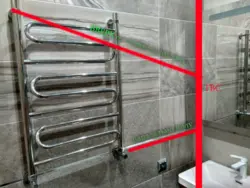 How to hang a heated towel rail in the bathroom photo