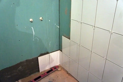 Tiles on drywall in the bathroom photo