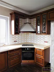 Photo Of The Kitchen With A Stove In The Corner