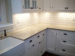 White kitchen apron and countertop design