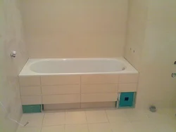 How to cover a bathtub with tiles photo