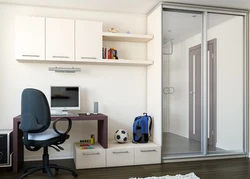 Wardrobe with table in the bedroom photo