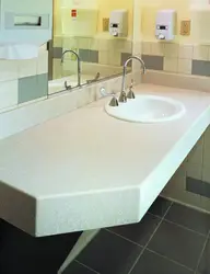 Artificial countertop in the bathroom photo