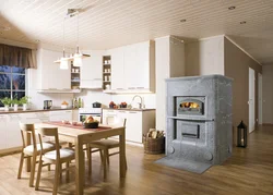 Stove fireplace in the kitchen interior