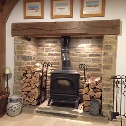 Stove fireplace in the kitchen interior