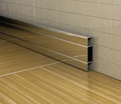 Baseboards In The Bathroom On The Floor Photo