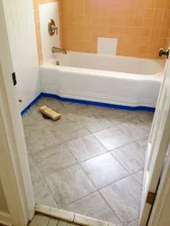 Baseboards in the bathroom on the floor photo