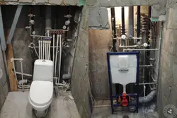 Plumbing in the bathroom and toilet photo