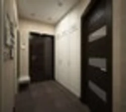 Hallway design in an apartment with dark floors