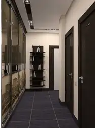 Дызайн пярэднім пакоі ў кватэры з цёмнымі крысамі