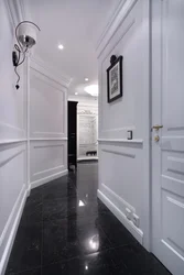 Hallway Design In An Apartment With Dark Floors