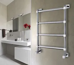 Electric heated towel rail for bathtub photo