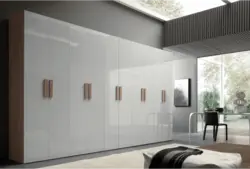 Wardrobe with hinged doors in the living room photo